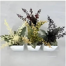 Artificial bonsai set in three white pots with dark, cream, and green branches