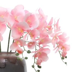 Huitich artificial red rose flowers displayed in a dark vase with delicate pink petals