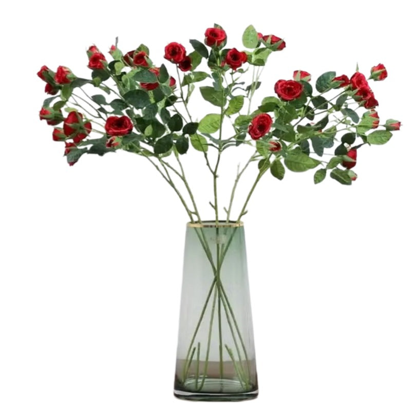 Huitich artificial red rose spray with green leaves arranged in a clear glass vase