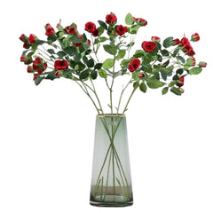 Huitich artificial red rose spray with green leaves arranged in a clear glass vase