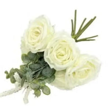 Artificial rose bouquet with white roses, dark green leaves and faux stems