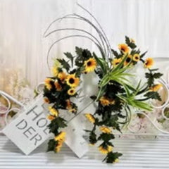 Huitich artificial sunflower wall hanging with vibrant yellow flowers and green leaves in a decorative style