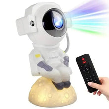 White astronaut night light with glowing blue headlight and heart remote control