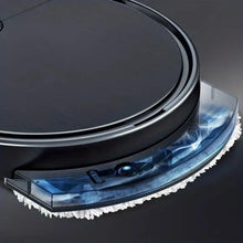 Robotic vacuum underside with edge brush and rotating cleaning pad