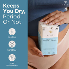 AZAH organic cotton panty liners box held by woman in nude underwear highlighting ultra thin liners and benefits