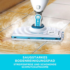 Steam mop with blue-striped replacement pad gliding on tile floor