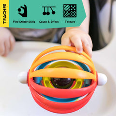 Ba Einstein baby high chair activity toy colorful nesting ring spinner with mirror held by babys hand on tray