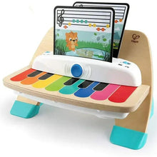 Wooden musical toy piano with illustrated tablet screen and rainbow piano keys