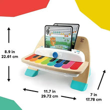 Wooden baby piano toy with colorful keys and built-in screen, teal support feet