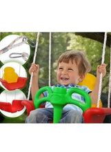 Baby swing chair with yellow seat, green handle, red base, with baby seated outdoors