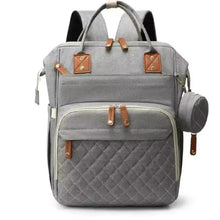 Large gray diaper travel backpack with quilted front, tan leather trim, double zippers