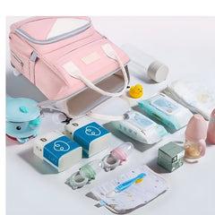 Huitich baby travel backpack pink with baby essentials including bottles, diapers, wipes, and toys
