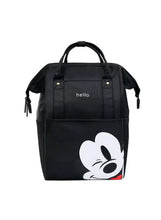 Black baby travel bag with cartoon character face, top handles, front pocket and zipper tabs