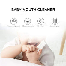 Baby in reclined pose with infant mouth cleaner brush at mouth