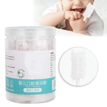 Baby oral cleaner jar with close-up of white sponge tongue brush tip