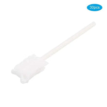 Baby mouth cleaner brush with white textured head on long handle