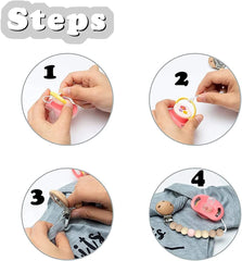 Hystyfu hands demonstrating four step assembly and attachment of wooden beaded baby pacifier clip set to clothing