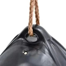 Black ball swing seat with tan rope loops and metal ring attachment