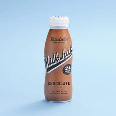 Barebells protein milkshake UAE chocolate flavor bottle with 24g protein lactose free no added sugar on blue background