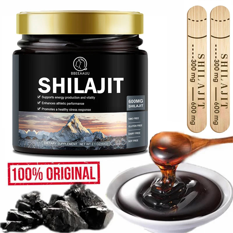 Mumzar pure shilajit resin supplement in a jar with two measuring sticks and mineral rocks