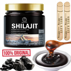 Mumzar pure shilajit resin supplement in a jar with two measuring sticks and mineral rocks