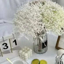 Artificial flower bouquet decor with dense white sprigs