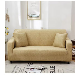 Huitich beige elastic sofa cover fitted on two-seater couch with matching pillows in modern living room