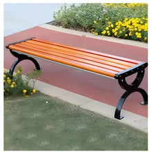 Outdoor garden bench with orange slatted top, black end supports, arched legs