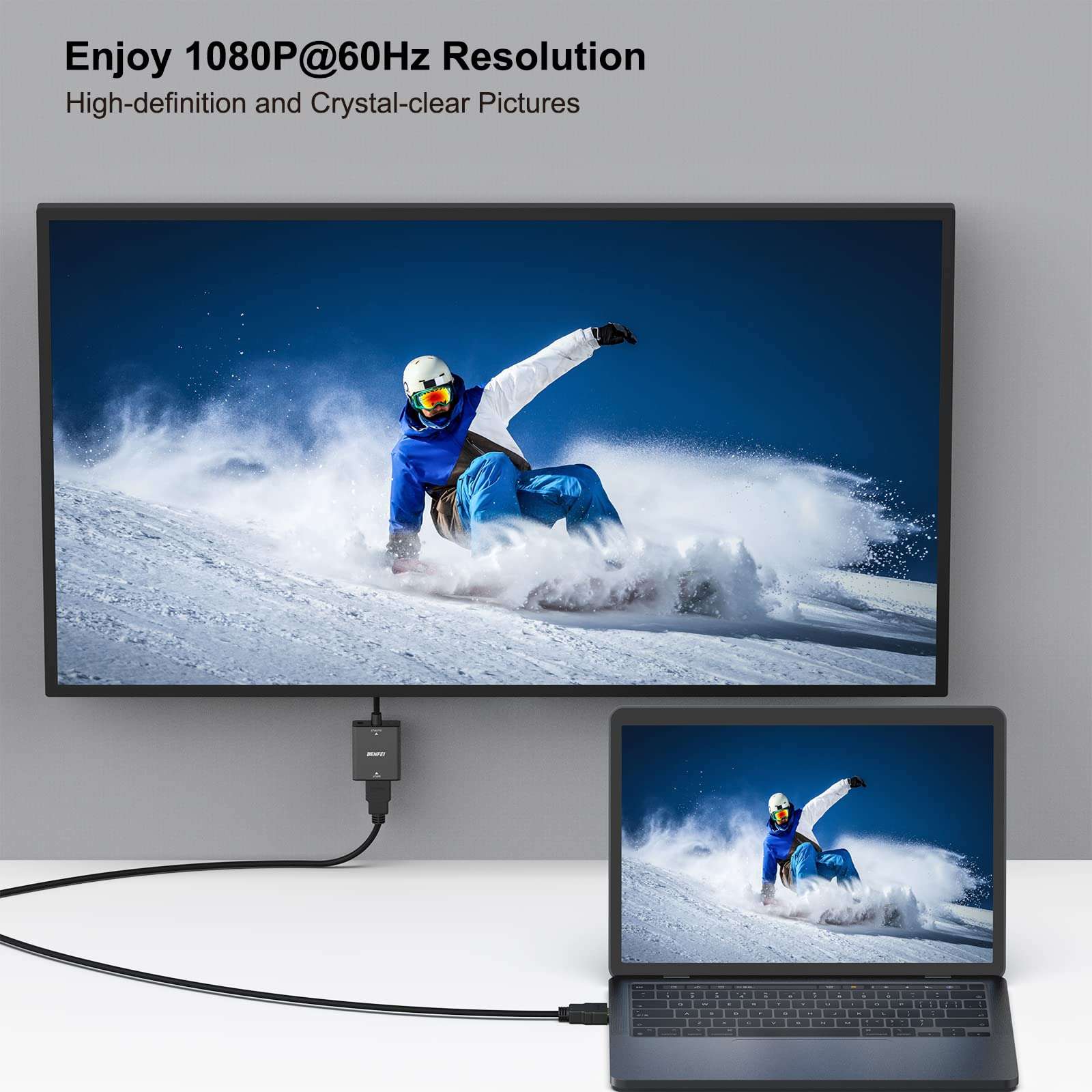 BENFEI HDMI to VGA adapter with audio connecting laptop to monitor displaying snowboarder in high definition