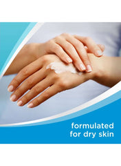 Applying Bepanthen skin moisturizing cream on dry hands for effective hydration and nourishment