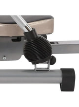 Adjustable resistance knob and handle on compact rowing machine frame