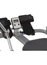 Rowing machine console with display and two padded handlebars on silver frame
