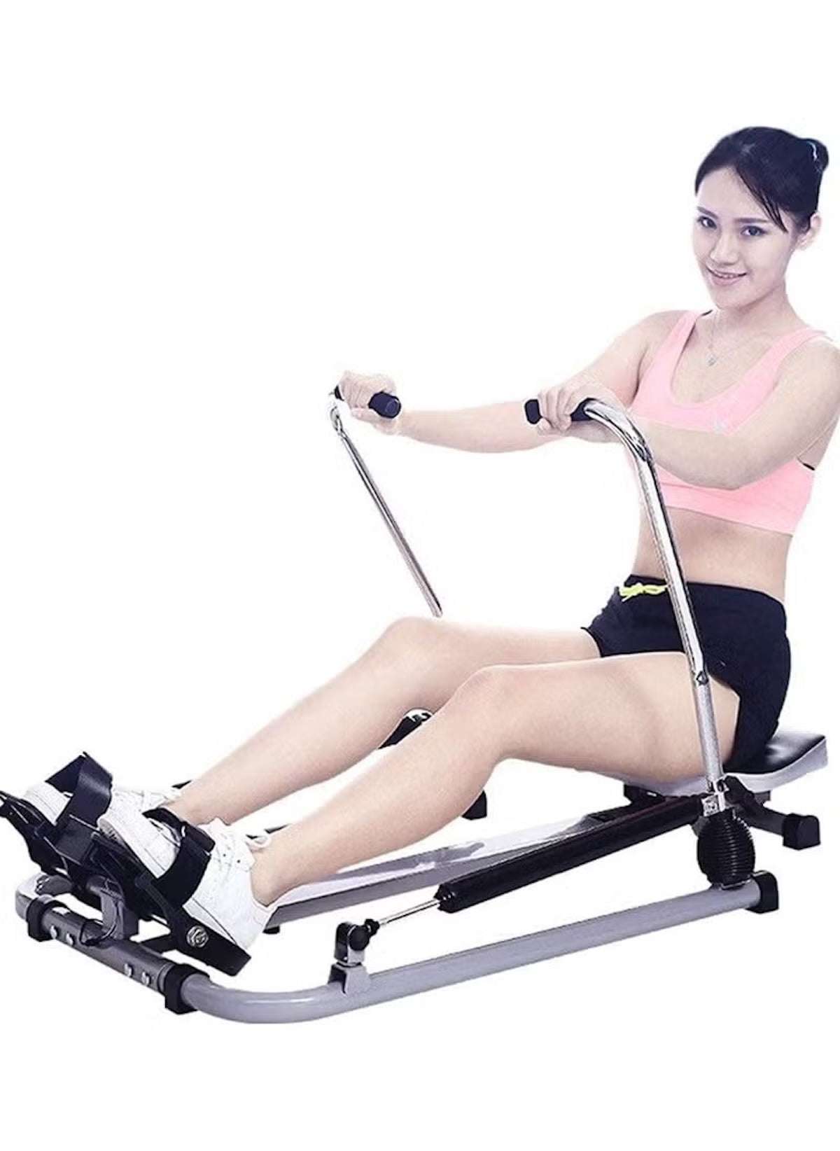 Woman using Huitich rowing machine for workout showing best home fitness rower Dubai