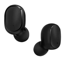 Black true wireless earbuds close-up, rounded tips and mic dots on stems