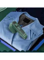 Huitich handheld steam iron positioned on a blue shirt highlighting the best wrinkle removal iron for clothes