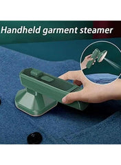 Huitich handheld steam iron used on fabric demonstrating the best wrinkle removal iron for clothes