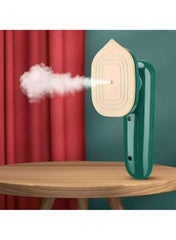 Huitich handheld steam iron releasing steam on wooden table best wrinkle removal iron for clothes