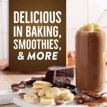 Cacao powder sign beside a smoothie glass with chocolate pieces and bananas