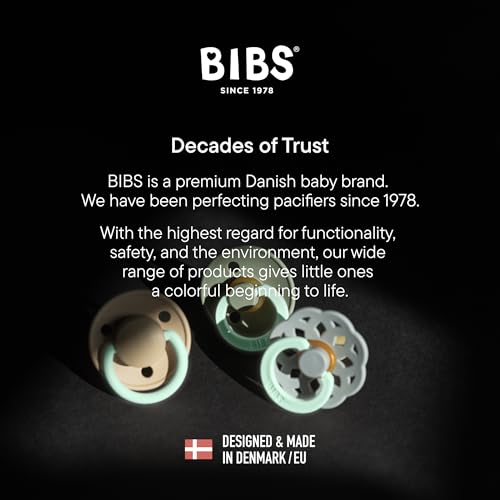 Three BIBS pacifiers on dark background with branding and Danish flag highlighting glow in the dark baby pacifier