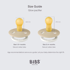 Size guide showing two beige glow in the dark baby pacifier models size 1 0 months and size 2 6 months with nipple sizes