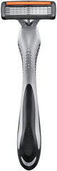 Silver and black Bic Flex 4 men razors with ergonomic grip four blade cartridge and lubricating strip for close shave