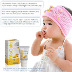 BioGaia probiotics drops for babies with product box and tube beside a toddler in pink headband