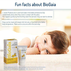 BioGaia probiotics drops for babies tube and box beside smiling baby lying on white blanket with product info