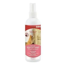 Cat keep-off spray bottle with white pump and red label