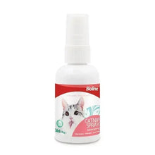 Catnip spray bottle with white cap and red label featuring a cat illustration