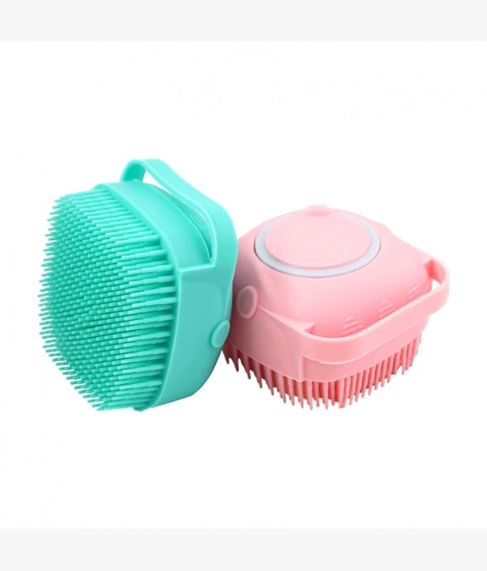 Bioline massage brush UAE in mint green and pink colors for gently grooming pets