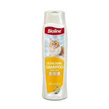 Cat deshedding shampoo bottle with illustrated cat and yellow front label