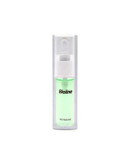 Pet perfume spray bottle with light green liquid and white flip-top nozzle