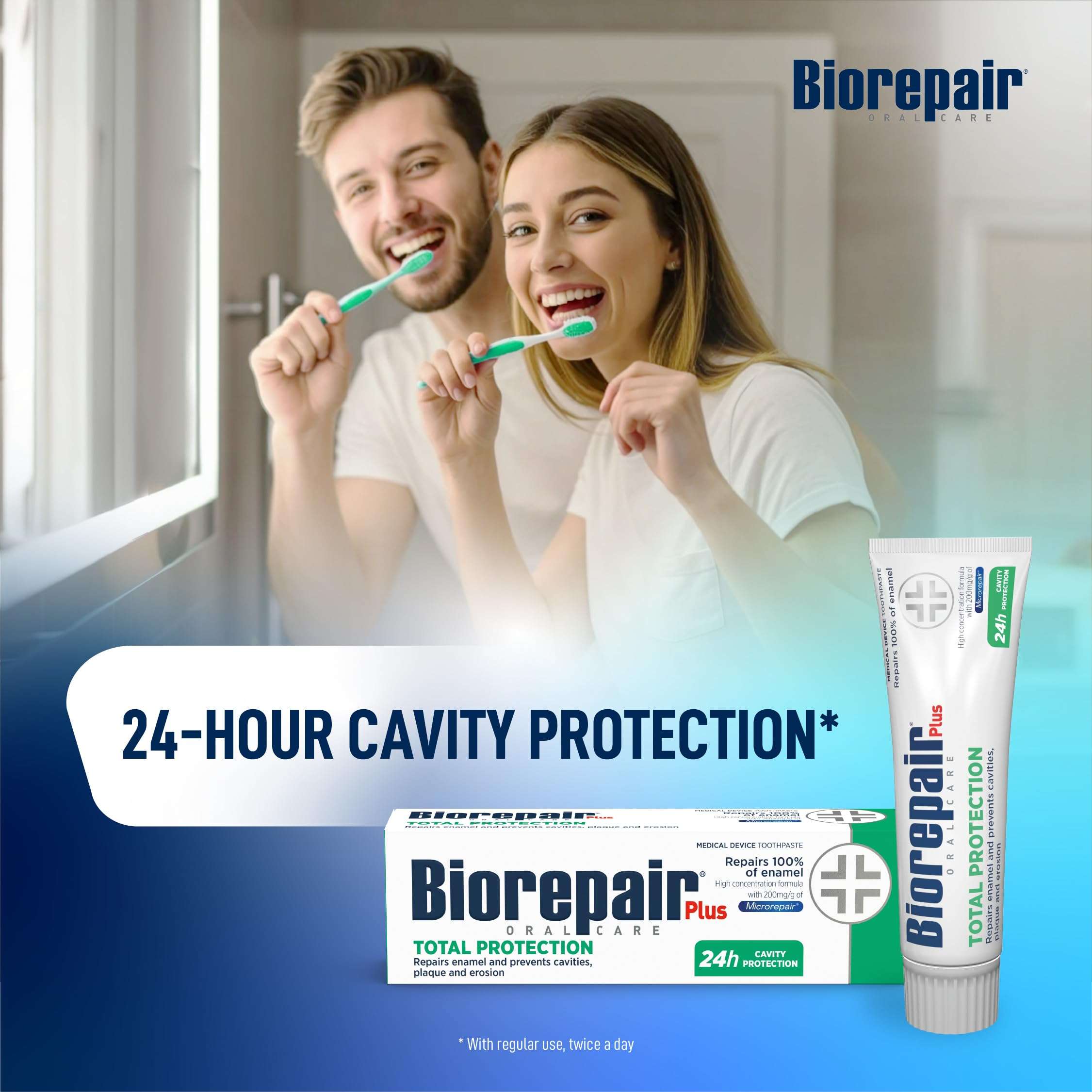 Smiling couple brushing teeth with Biorepair toothpaste UAE packaging and tube displaying 24 hour cavity protection