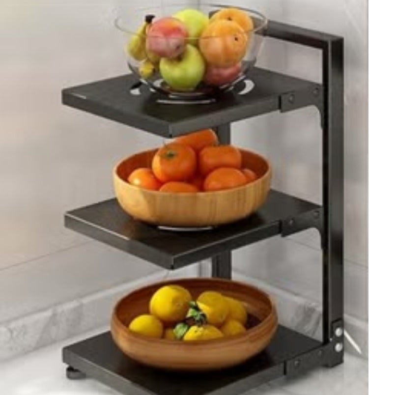 Huitich adjustable pot rack organizer with three black metal shelves holding bowls of fresh fruit